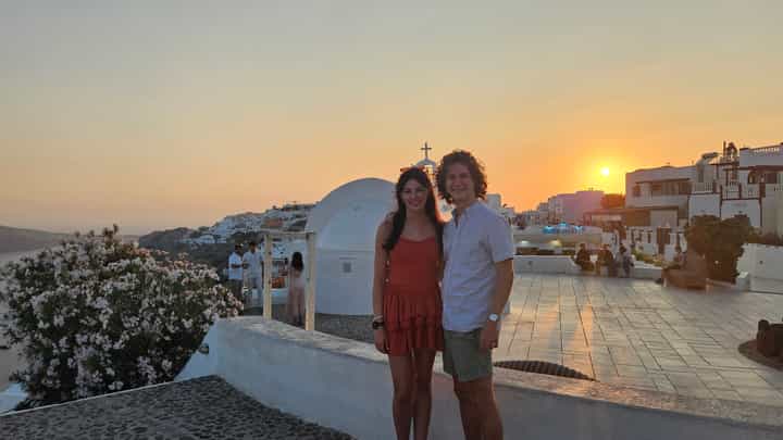 Enjoying the end of the sunset in Oia before eating.