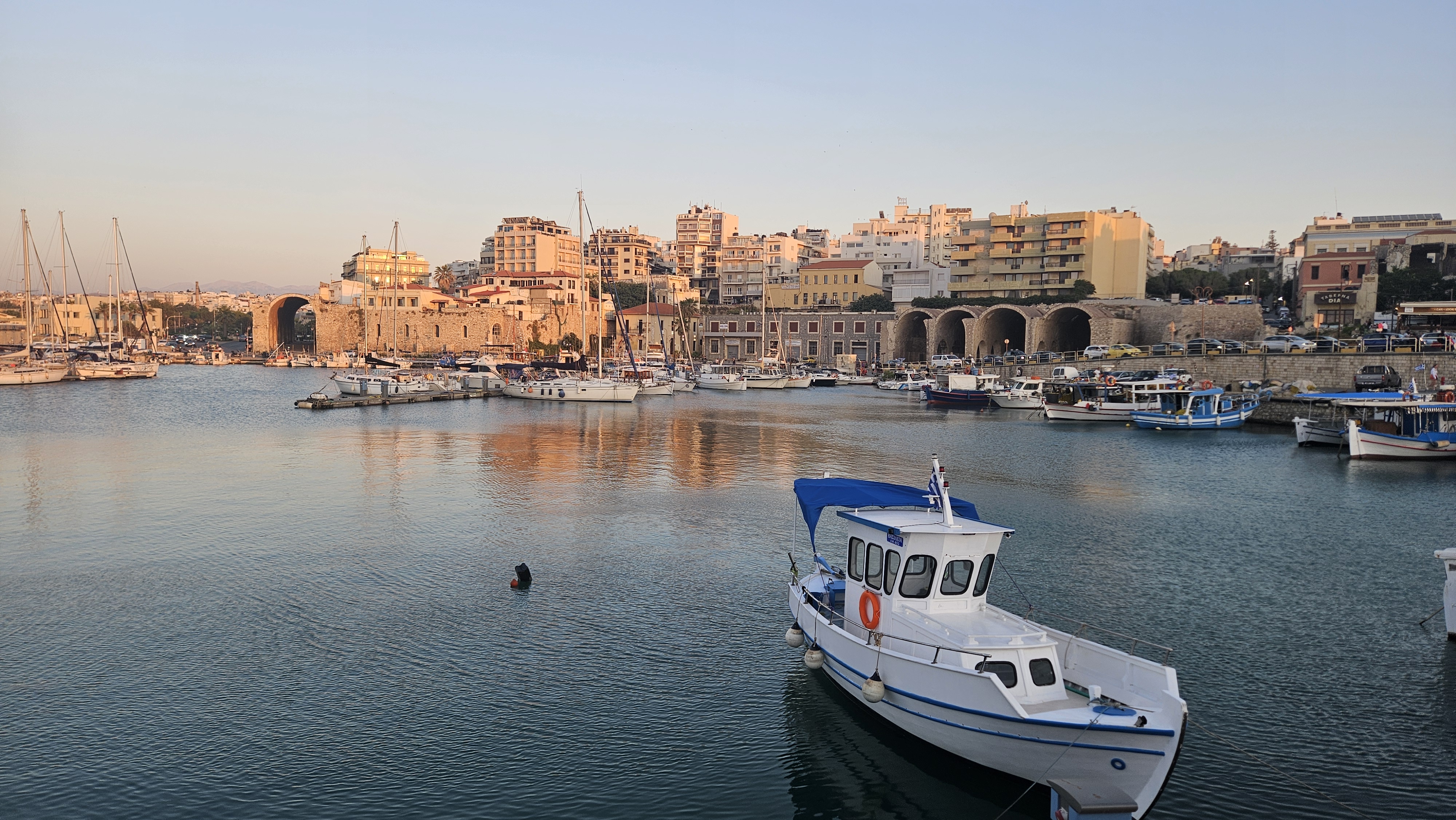 The view from the Venetian fort in the Heraklion harbor--you can see the old Venetian walls against the modern buildings.